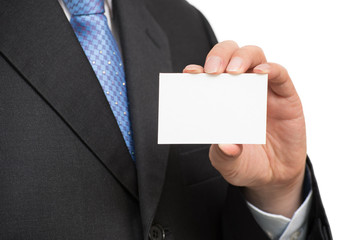 Man's hand showing business card - closeup shot on white background