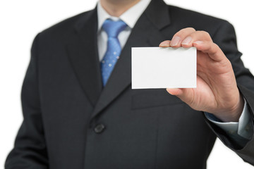 Man's hand showing business card - closeup shot on white background