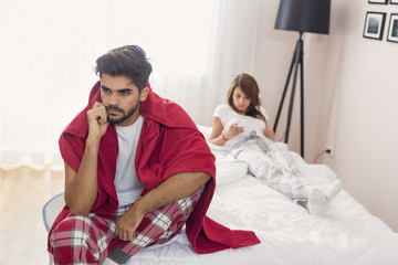 Couple fighting in bedroom
