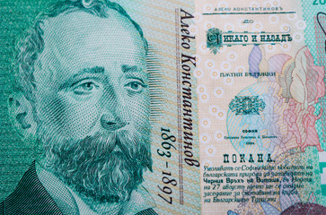 Photo depicts the Bulgarian currency banknote, 100 leva, BGN, close up. Depicts a portraiture of Aleko Konstantinov, famous Bulgarian poet.