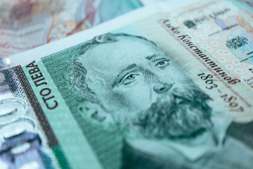 Photo depicts the Bulgarian currency banknote, 100 leva, BGN, close up. Depicts a portraiture of Aleko Konstantinov, famous Bulgarian poet.