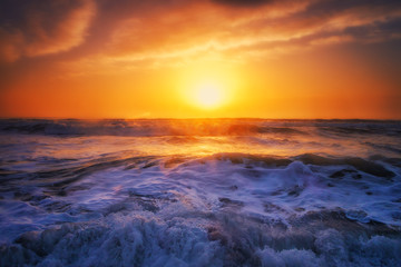 Aerial view over the sea, sunrise shot.