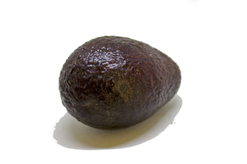 Whole black avocado