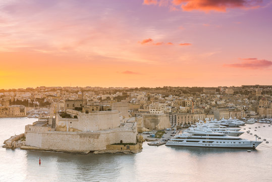 Sunrise over Birgu and Grand Harbor in Malta