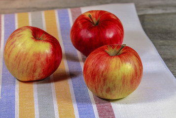 Apples on a wooden table