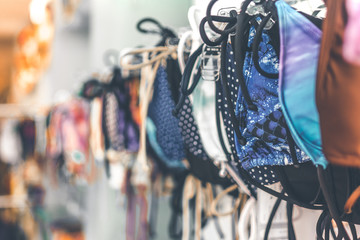 Fototapeta na wymiar Women swimsuits in the retail store on Bali island, Indonesia. Fashion shopping concept in Asia.