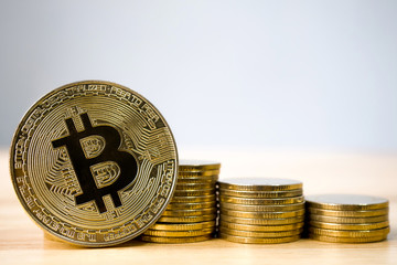Golden bitcoin with coin stack. Future currency and business financial blockchain concept