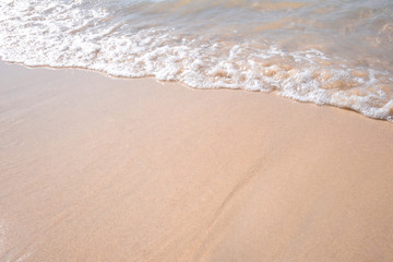 Fototapeta na wymiar Top view tropical beach water wave background with seaside. Background summer time season