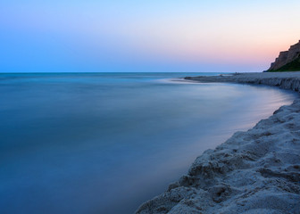 Magic landscape on the shores of the black sea with blurred water