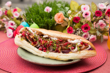 Tasty colorful sandwich with french bun.