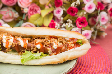 Tasty colorful sandwich with french bun.