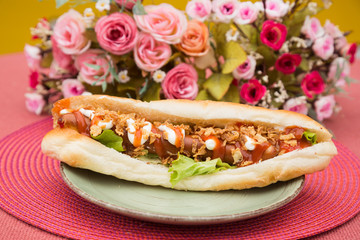 Tasty colorful sandwich with french bun.