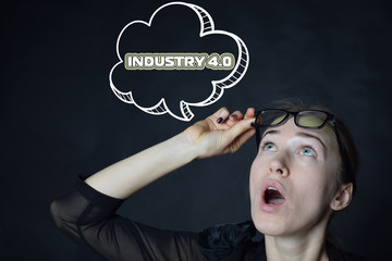 Above the businessman hangs a cloud with the inscription:INDUSTRY 4.0