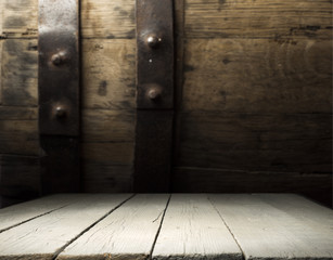 background of barrel and worn old table of wood