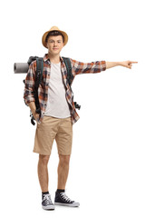 Teenage tourist pointing