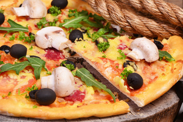 Very tasty mushrooms pizza tomatoes and olive