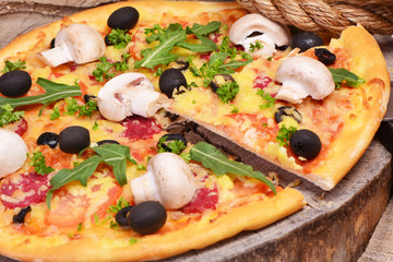 Very tasty mushrooms pizza tomatoes and olive