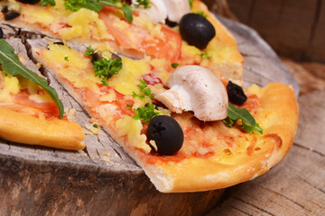 Very tasty mushrooms pizza tomatoes and olive