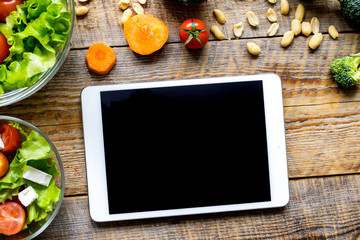 concept diet and tablet with vegetables mock up