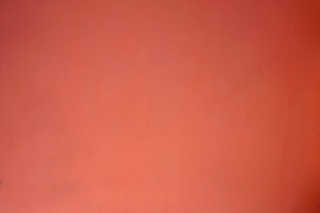 texture of a wall of red color with darkened corners