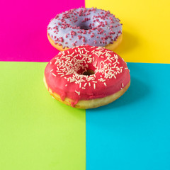 donuts on a beautiful colored background, pastel glamor colors