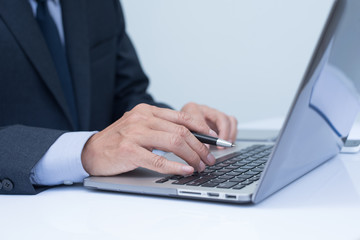 Businessman working on laptop computer