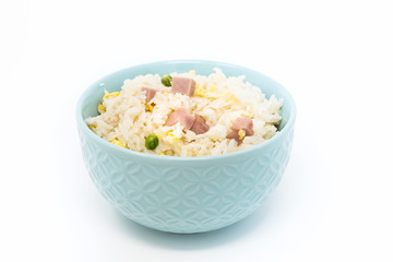 Homemade Chinese fried rice with vegetables and fried eggs