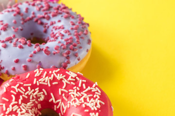 donuts on a beautiful colored background, pastel glamor colors