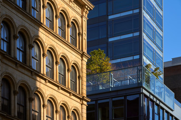 Soho building facades with contrasting architectural styles. New York City, Manhattan, Soho