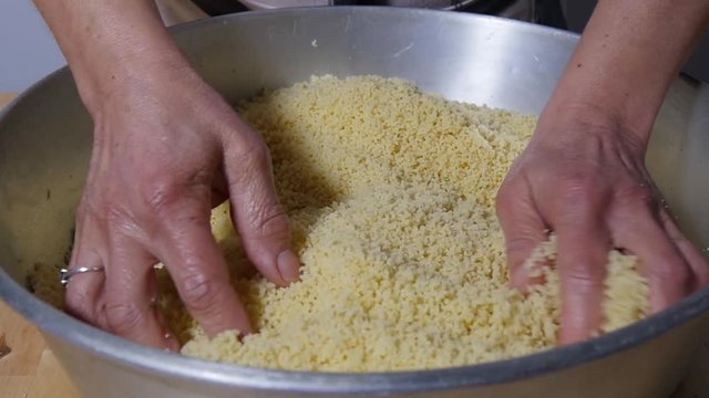 semolina preparation for couscous, slow motion