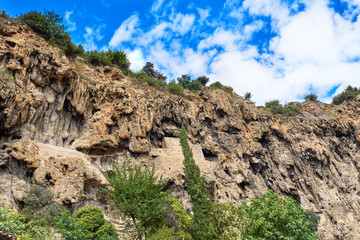 Looking up to the Falaise of Cotignac, escarpment with once inhabited caves, Provence