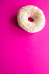 donuts on a beautiful colored background, pastel glamor colors