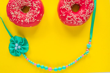 donuts on a beautiful colored background, pastel glamor colors