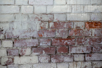 Old red brick wall background texture close up