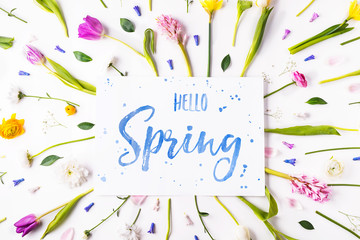 Easter and spring flat lay on a white background. © Halfpoint