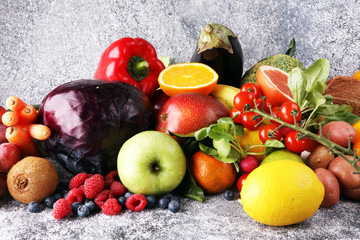 Composition with variety of raw organic vegetables and fruits. Balanced diet