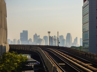 Fototapeta na wymiar Sky train tracks and skyscrapers in Bangkok, Thailand