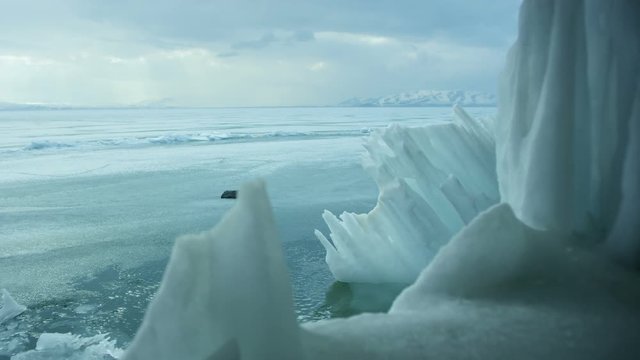 Icebergs on iced sea or ocean.