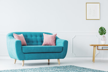 Turquoise sofa in minimalist interior - obrazy, fototapety, plakaty