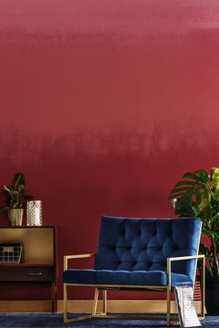 Sofa On Red Wall
