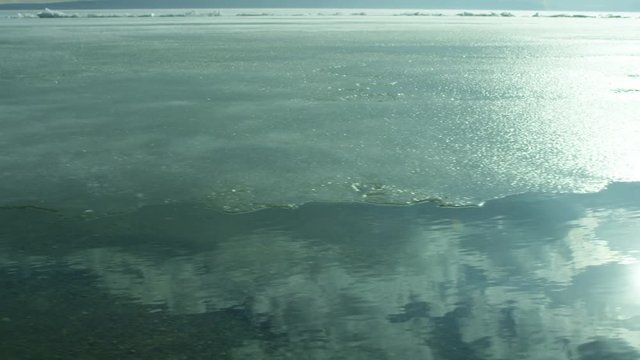 Beach of iced sea or ocean .