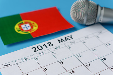 Calendar, microphone and flag