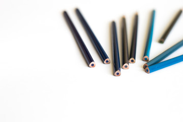 white pencil rests on the hand