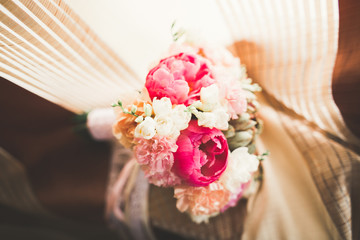 Wonderful luxury wedding bouquet of different flowers