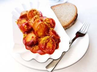 Tasty german sausage served with sauce