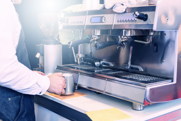 Man working with caffee machine