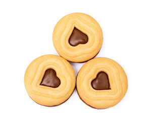 Chocolate heart in round biscuit isolated on white background