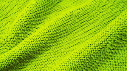 Green knitted background.
