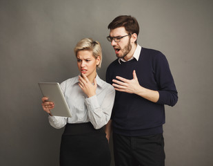 Couple with digital tablet