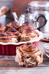 Fresh, homemade cinnamon buns in baking pan